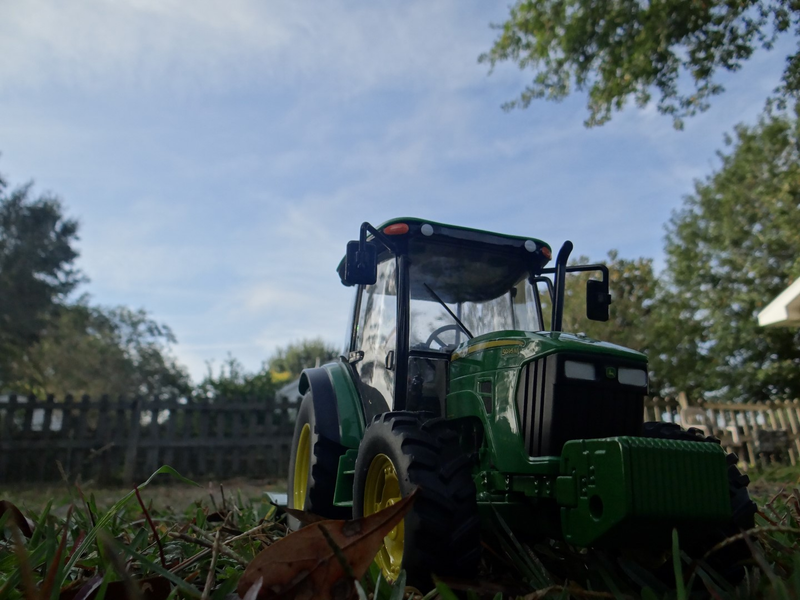 Illustration for article titled Tractor Thursday 1:16 ERTL John Deere 5095M w/ Mower